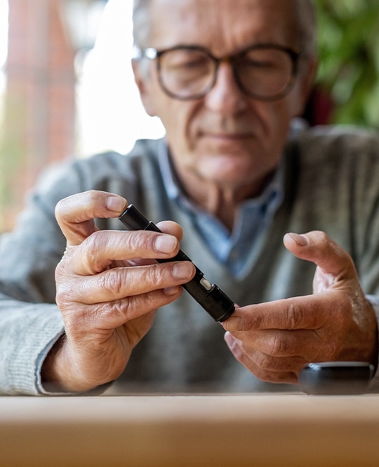 mature man wearing glasses